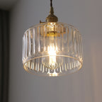 Suspension verre strié transparent et douille dorée, câble 150 cm