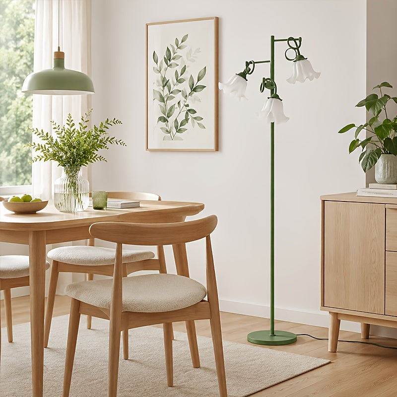 Lampadaire à trois fleurs blanches sur tiges vert sauge flexibles