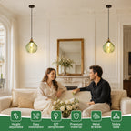 Suspension globe en verre vert nervuré, douille couleur laiton