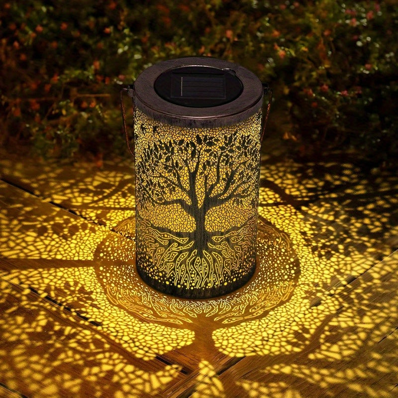 Lanterne solaire cylindre en métal ajouré, motif arbre de vie