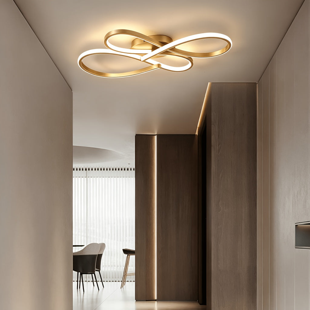 Plafonnier LED à boucles entrelacées 79 cm, noir, argenté ou doré
