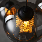 Suspension boule en verre gris fumé Ø 18 cm, à l'unité ou par trois