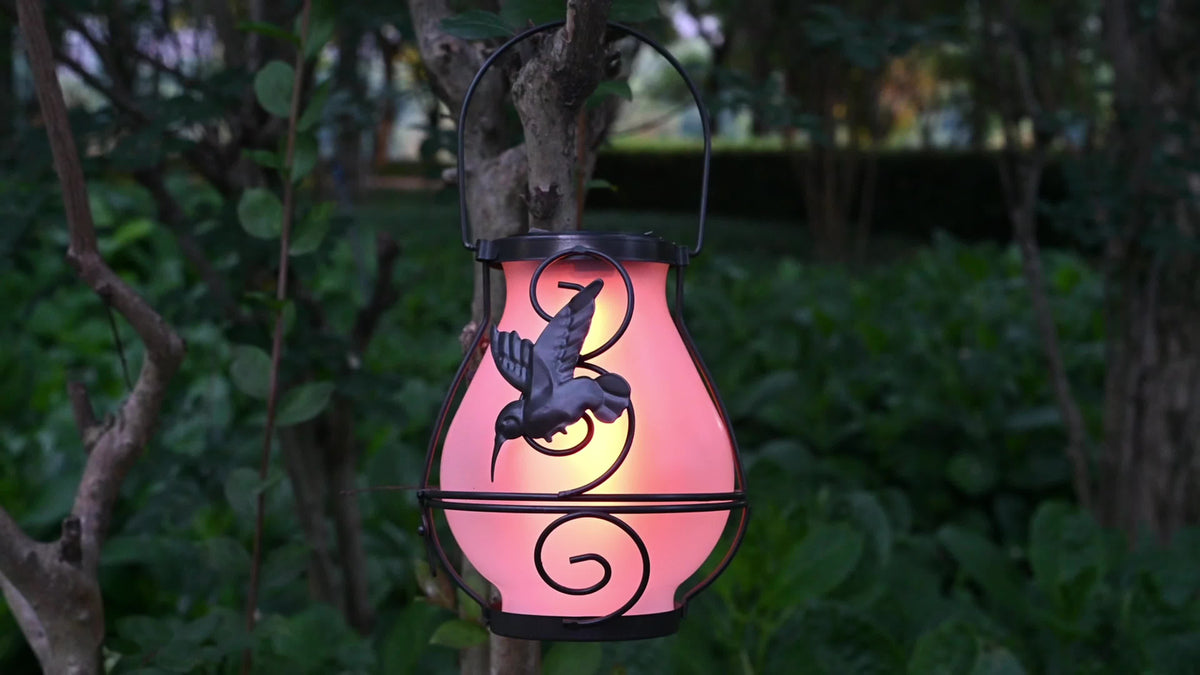 Lanterne solaire colibri en fer noir à effet flamme et anse