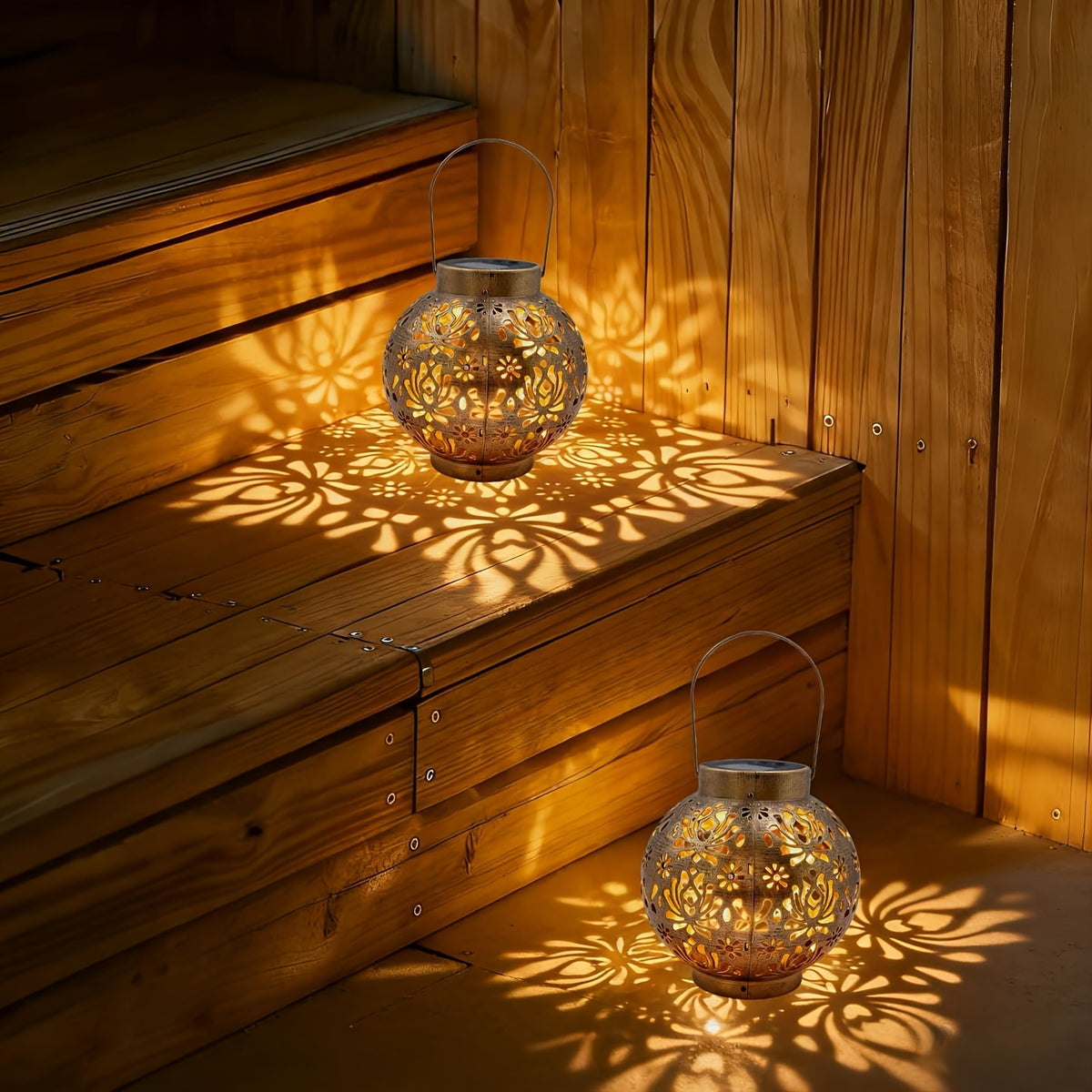 Lot de 2 lanternes solaires boules ajourées dorées, style marocain
