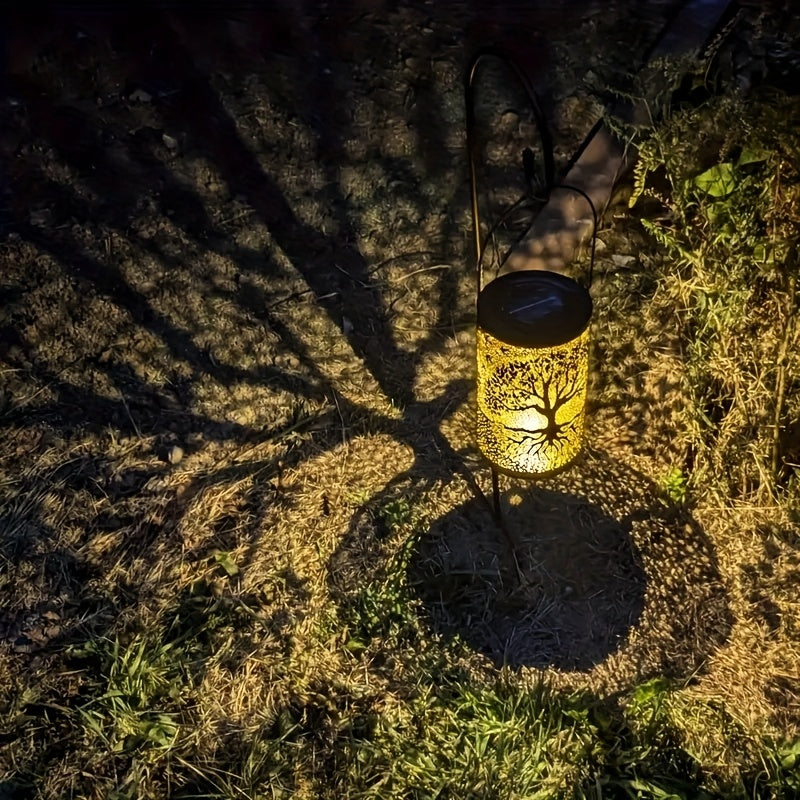 Lanterne solaire cylindre en métal ajouré, motif arbre de vie