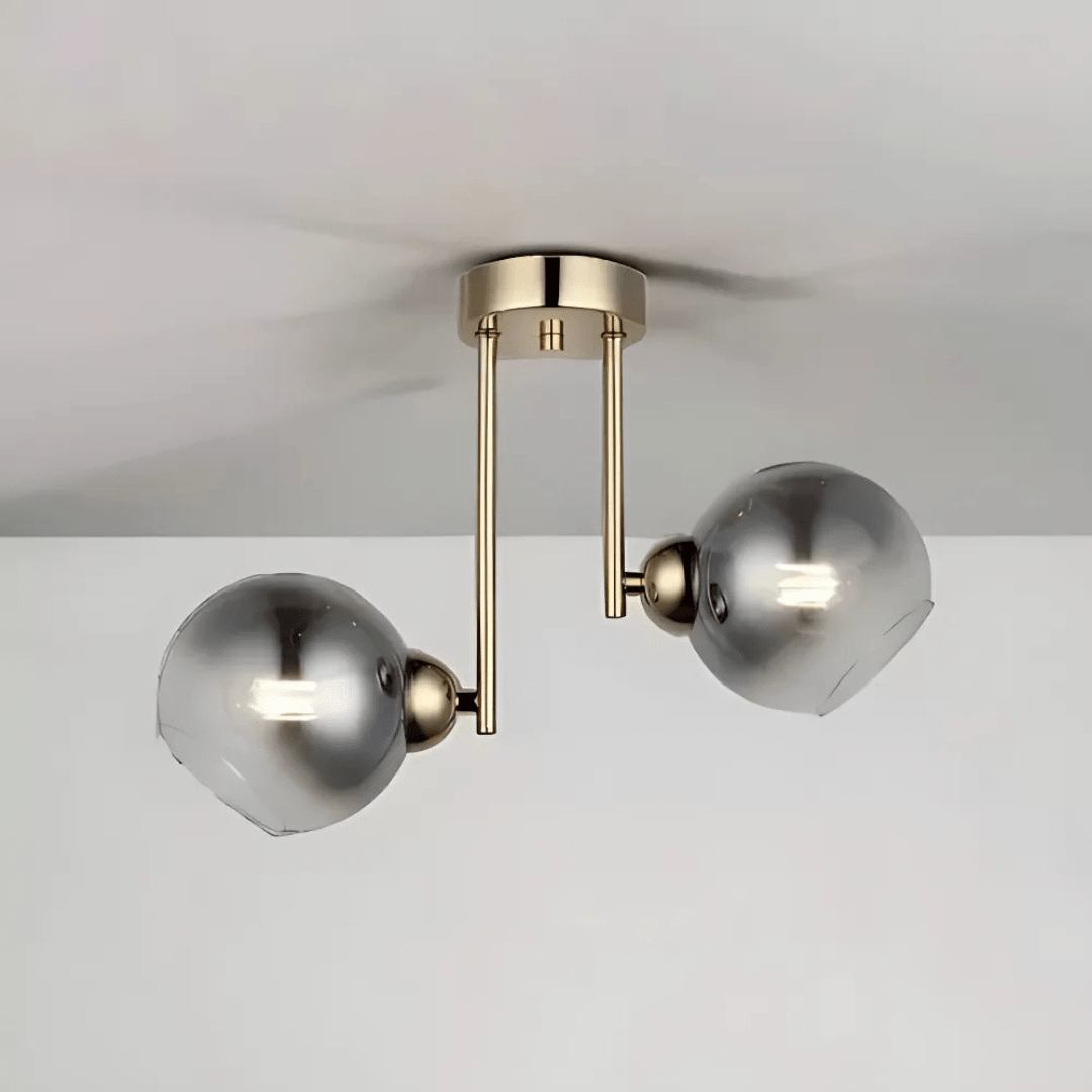Plafonnier design doré aux globes de verre fumé
