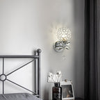 Applique murale globe en cristal doré à rubans entrelacés