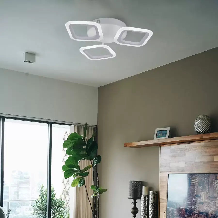 Plafonnier blanc à trois carrés aux angles arrondis