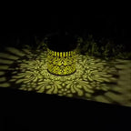 Lanterne solaire boule ajourée finition laiton ou noire, lumière RVB