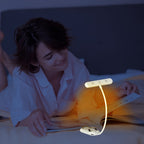 Liseuse à pince 25 LED en lumière ambrée, minuterie, 2 coloris