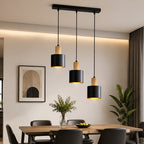 Suspension 3 abat-jour noirs à col effet bois, intérieur doré