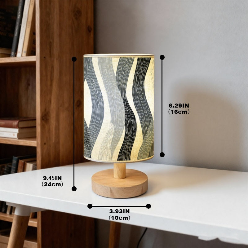 Lampe de chevet à lignes ondulées grises, socle bois, trois teintes